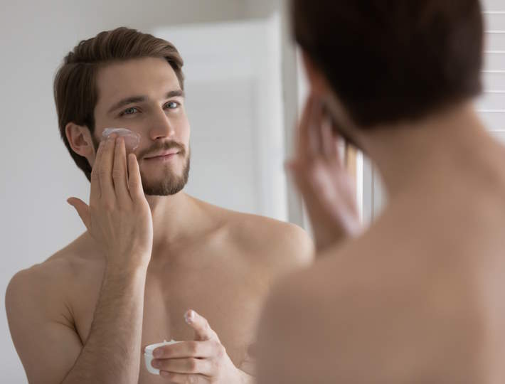 Skincare for Men: A Beginner's Perspective, Handsome,Millennial,Man,Look,In,Bathroom,Mirror,After,Shower,Apply